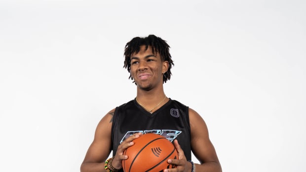 ZZ Clark holding a basketball